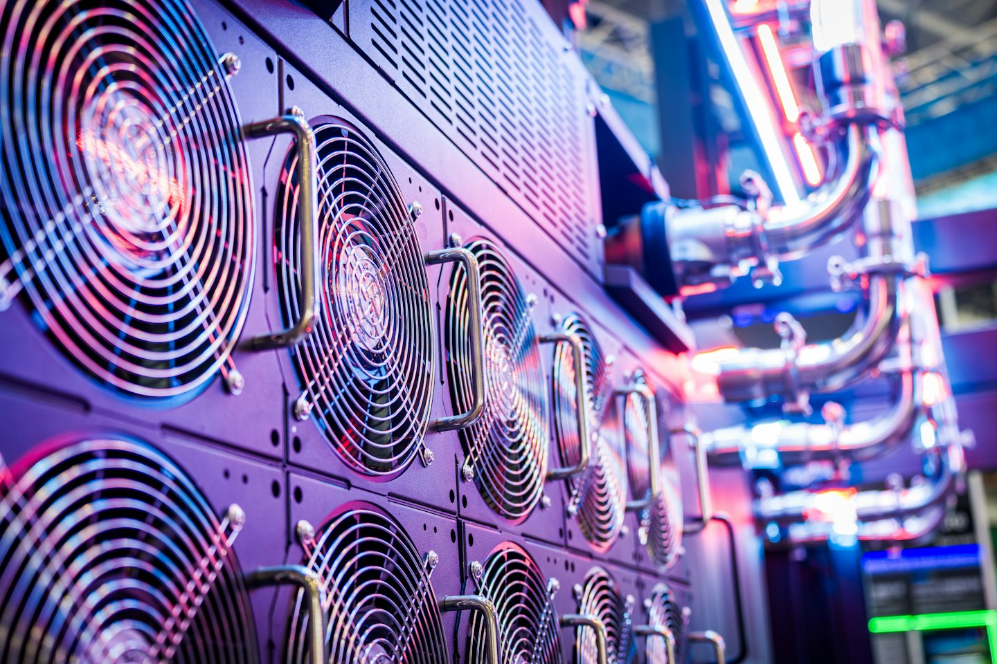 Rows of server cooling fans and hardware in a data center.